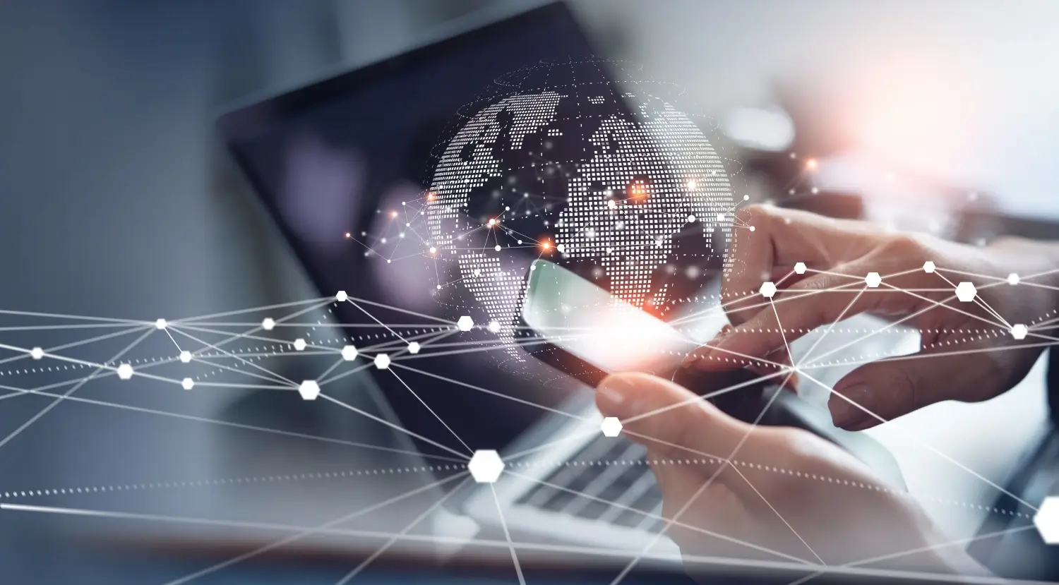 Business person using smartphone and laptop with digital global network connections