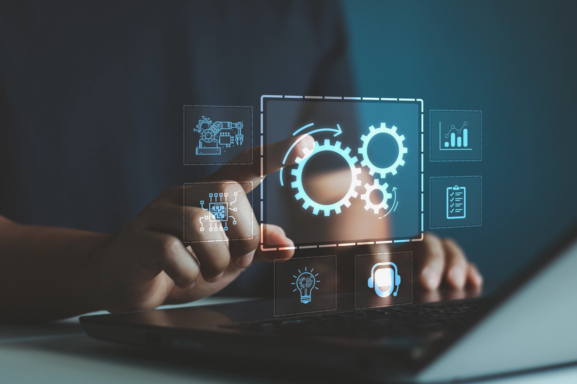 IT professional using a laptop to manage digital automation processes, with holographic icons representing AI, machine learning, and business process optimization—illustrating IsoSkills’ expertise in intelligent automation and IT transformation